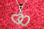 Heartland 10K White Gold 1/8 Cttw Diamond Double Interlocking Hearts Pendant