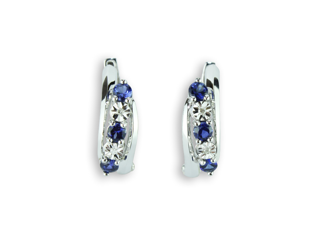 Exquisite Gemstone Cuff Earrings Featuring 4 Sparkling Diamonds and 6 Stunning Blue Ceylon Created Sapphires in 10K White Gold