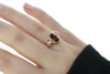 Diamond (1/15 cttw) & Garnet Gemstone Ring in 10K Rose (Pink) Gold And 925 Sterling Silver, Featuring 32 Diamonds