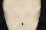 Breathtaking London Blue Topaz and 1/20 carat Diamond Pendant in Sterling Silver (925)