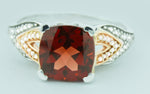 Elegant Garnet Cushion Gemstone Ring With Brilliant 1/10 cttw Diamonds In Classic 10K Rose & White Gold Setting