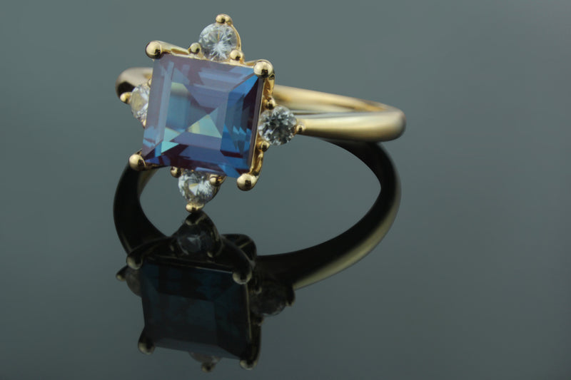 Stunning Created Alexandrite and Created White Sapphire Ring Set In Elegant 10K Rose (Pink) Gold