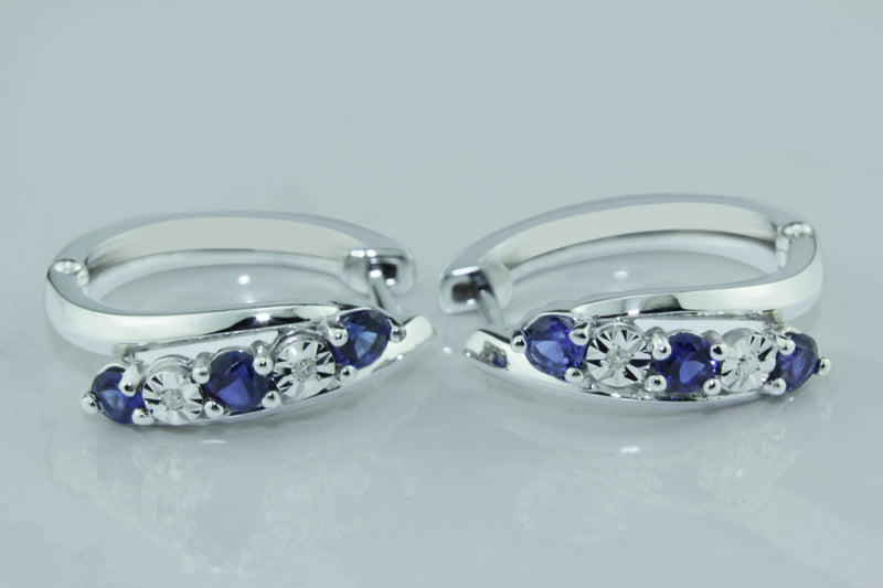 Exquisite Gemstone Cuff Earrings Featuring 4 Sparkling Diamonds and 6 Stunning Blue Ceylon Created Sapphires in 10K White Gold