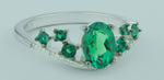 Luxurious Created Emerald Gemstone And 1/20 cttw Diamond Ring in 925 Sterling Silver Featuring 27 Diamonds