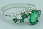 Luxurious Created Emerald Gemstone And 1/20 cttw Diamond Ring in 925 Sterling Silver Featuring 27 Diamonds