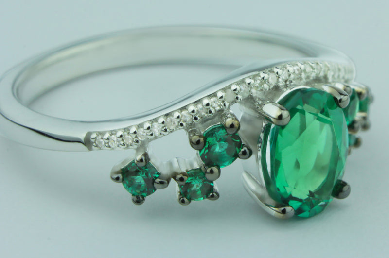 Luxurious Created Emerald Gemstone And 1/20 cttw Diamond Ring in 925 Sterling Silver Featuring 27 Diamonds