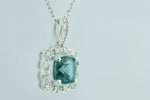 Breathtaking London Blue Topaz and 1/20 carat Diamond Pendant in Sterling Silver (925)