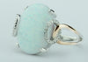 Classic 1/15 cttw Diamond & Created Opal Ring in 10K Rose Gold and 925 Sterling Silver